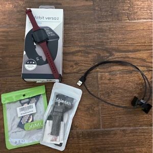 Fitbit Versa 2 in brand new with all the accessories and the box it came in.